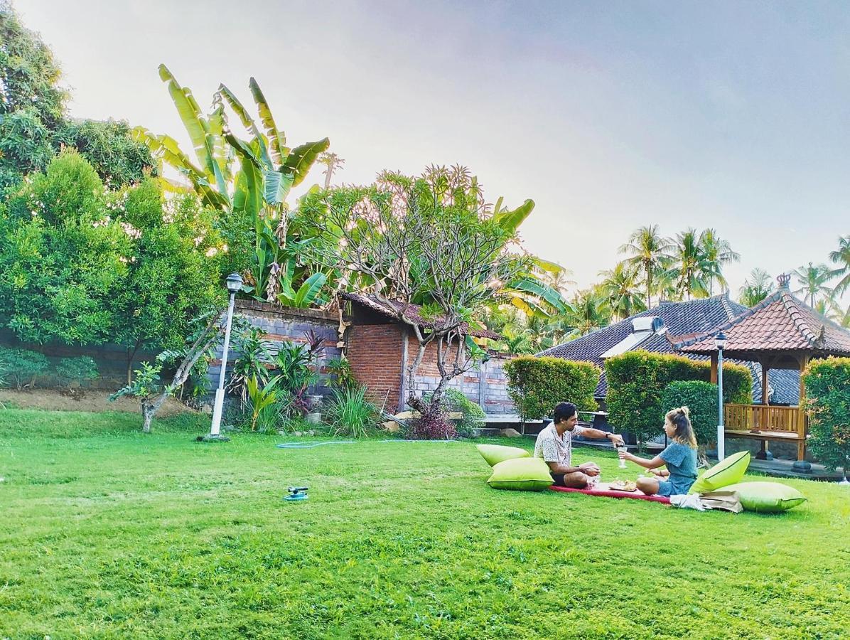 Kaia Lovina Guest House Junior Suite Buitenkant foto
